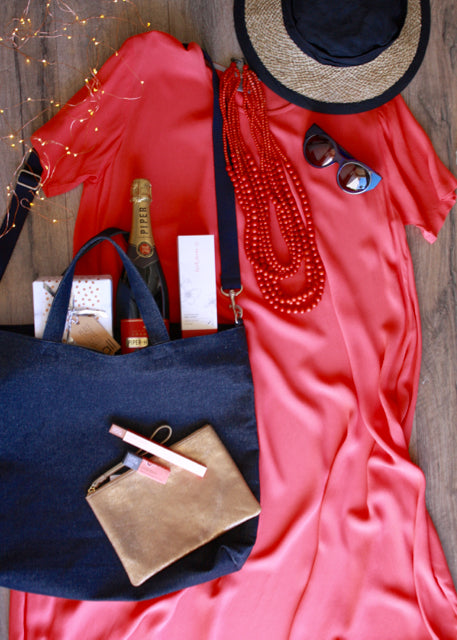 Flat lay of navy and coral outfit chosen by Hall NZ for Christmas